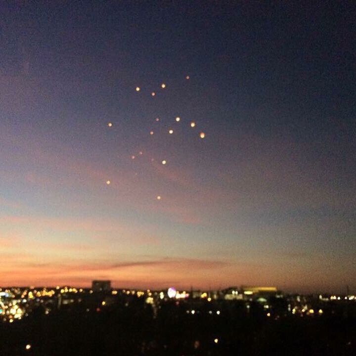 VIEW OF ILLUMINATED CITYSCAPE