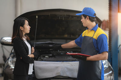Side view of a couple working