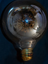 Close-up of illuminated light bulb