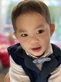  cute boy smiling at home