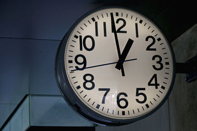 Close-up of clock on wall