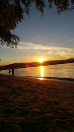 Scenic view of sea at sunset