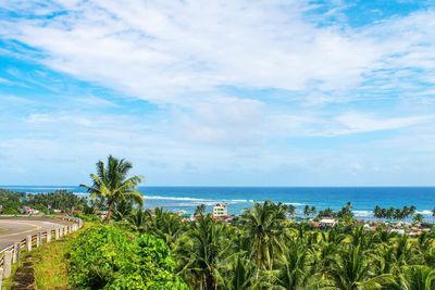 Scenic view of sea against cloudy sky