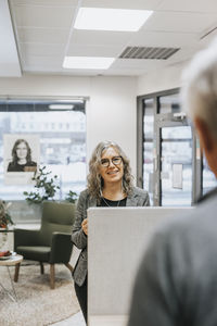 Woman at work talking to someone