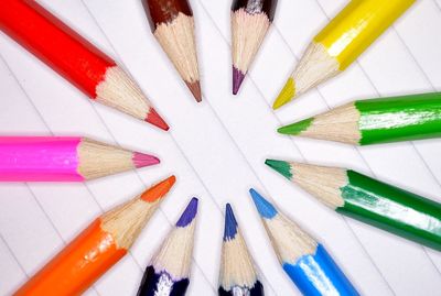 Close-up of colored pencils on table