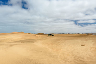 Scenic view of desert against sky