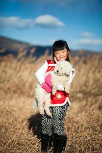 Full length of girl looking at camera