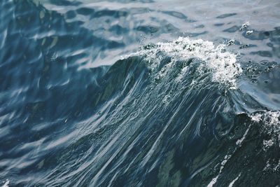 Close-up of sea waves splashing on shore