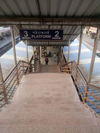 High angle view of steps leading towards railroad station platform