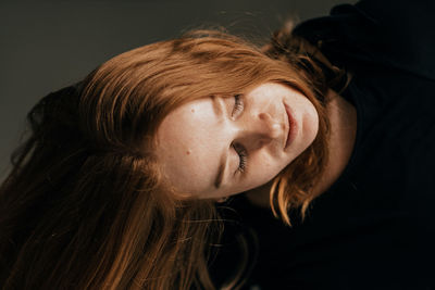 Close-up of young woman dancing