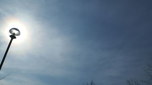 Low angle view of street light against sky