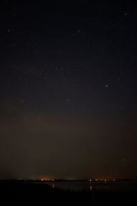 Scenic view of star field against sky at night