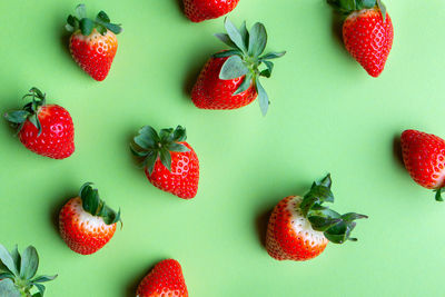 High angle view of strawberries on table