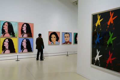 People standing in front of museum