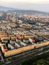 High angle view of buildings in city against sky