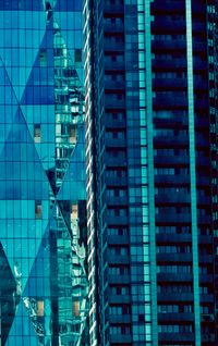 Low angle view of modern buildings in city