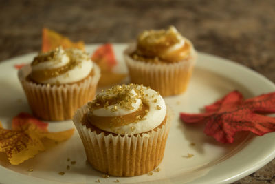 Close-up of cupcakes on table