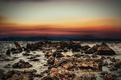 Scenic view of sea at sunset