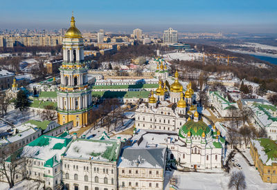 Beautiful winter top view of the kiev-pechersk lavra. beautiful panorama of kiev in the afternoon.