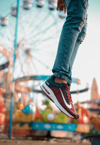 Low section of person at amusement park