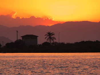 Scenic view of sea against sky during sunset