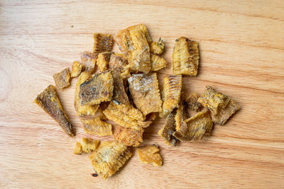 High angle view of bread on cutting board