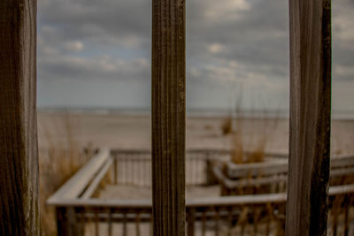 Close-up of wood against sky