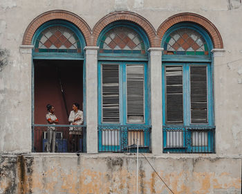 People standing outside building