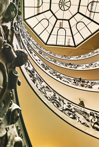 Low angle view of spiral staircase in building