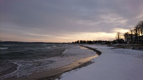 Scenic view of beach during sunset