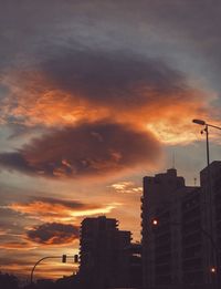 View of skyscrapers at sunset