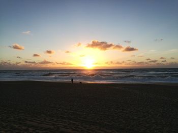 Scenic view of beach during sunset