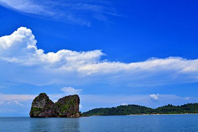 Scenic view of sea against blue sky