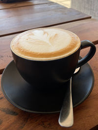 A close up of a delicious cappuccino at brew me cafe, lusaka, zambia 