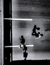 High angle view of people walking on street