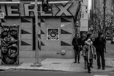 People walking on city street