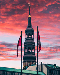 Low angle view of building against sky during sunset