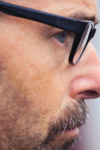 Close-up portrait of man wearing mask