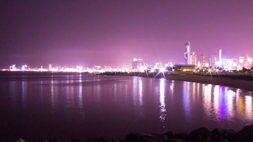 View of illuminated city at night