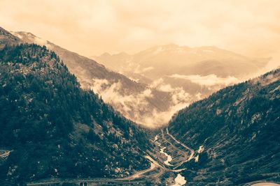 Scenic view of mountains against sky during sunset