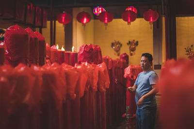 Man standing at temple