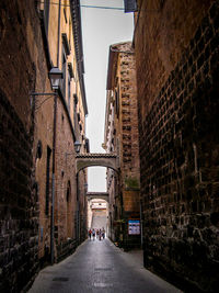 Narrow alley along buildings