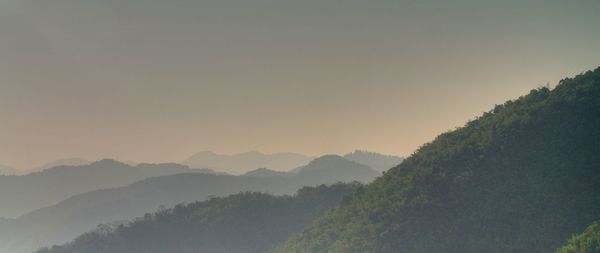 Scenic view of mountains against sky during sunset
