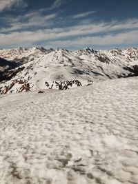 Scenic view of snowcapped mountains against sky