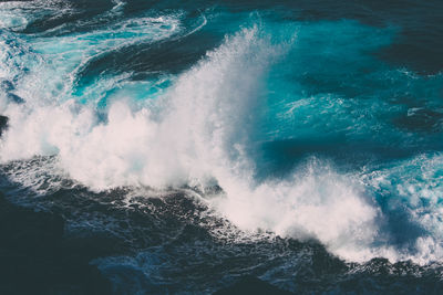 Waves splashing on rocks