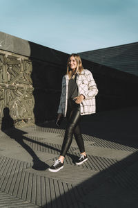 Full length portrait of woman