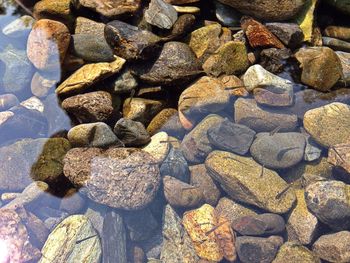 Full frame shot of pebbles on rocks
