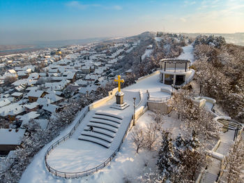 High angle view of snowcapped mountain against sky