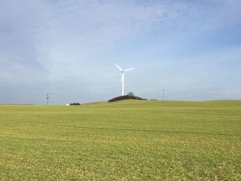 Wind turbines on field