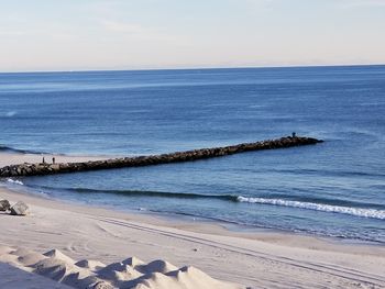 Scenic view of beach against sky